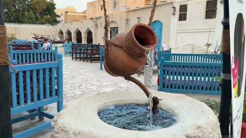 Traditional Arabic Pottery Water Fountain and Stone Well