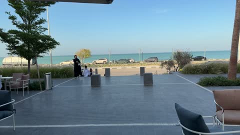 Coastal Restaurant Terrace People Walking Near Sea