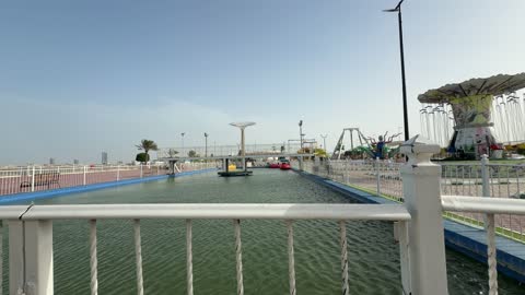 Amusement Park Water Canal and Rides Daylight Footage