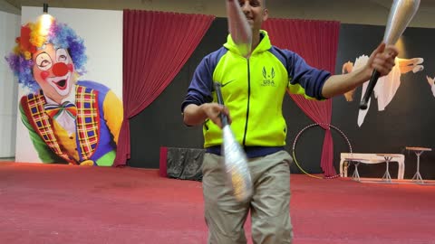 Circus Juggler Performing With Clubs on Stage Video