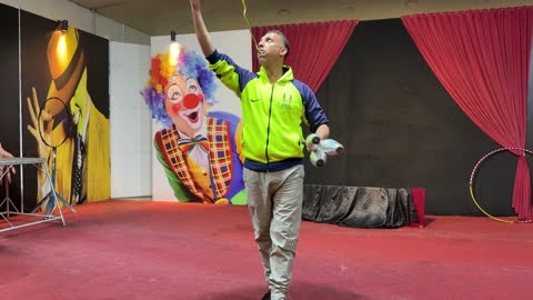 Circus Performer Juggling Clubs on Stage Video