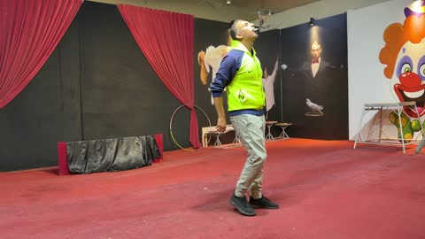 Circus Performer Balancing Act on Stage