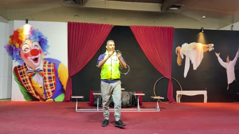 Circus Magician Performing Linking Rings Magic Trick