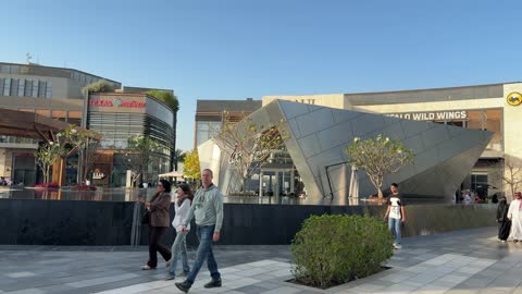 People Walking Modern Outdoor Shopping Plaza Footage
