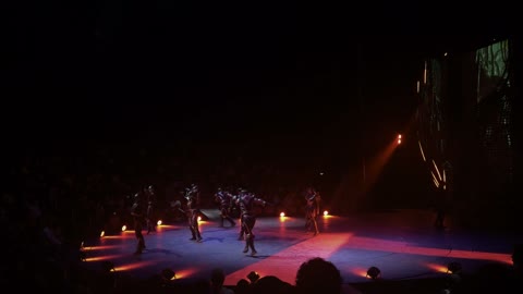 Circus Performers Dance on Stage During Live Show