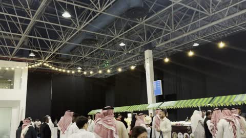 Saudi Exhibition Market People Walking Traditional Dress