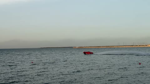 Red Jet Car High Speed Sea Water Motion Video Clip