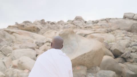 Pilgrim at Mount Arafat Makkah Walking Tracking Shot