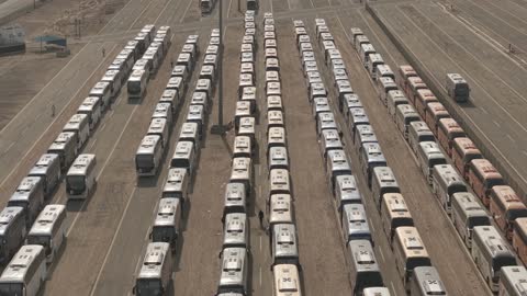 Aerial shot of the Hajj bus fleet in the transportation waiting area.