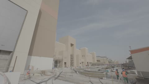 Commercial Construction Site with Heavy Machinery Building