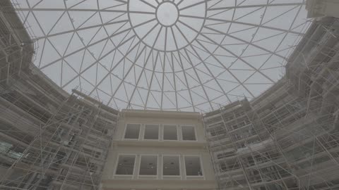 Modern Atrium Construction with Glass Dome Ceiling