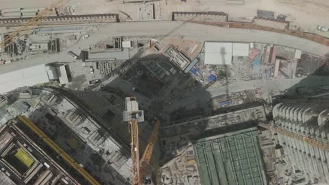 Aerial Top-Down View Construction Site Crane Operation