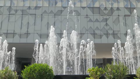 Modern Water Fountain and Geometric Building Video