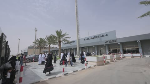 Al Qaisumah Airport Passengers Walking Toward Terminal