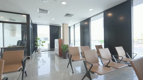 Modern Waiting Lounge Interior with Seating and Daylight