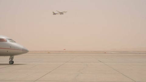 Private Jet and Airplane Takeoff During Sandstorm