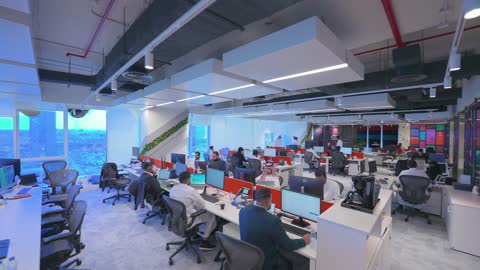 Modern Saudi Arabian Office Workspace with Employees