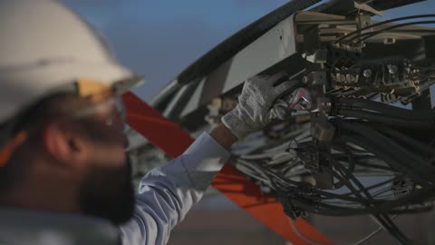 Electrical Engineer Solar Panel Maintenance Close Up