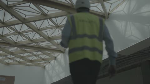 Engineer Walking in Modern Construction Site Footage