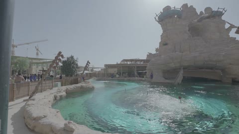 Themed Water Park Pool and Rock Formations Daylight Footage
