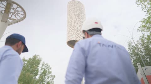 Tawal Engineers Inspecting Telecommunications Tower