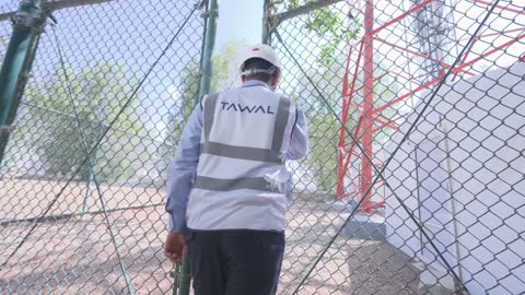 Technician Entering Telecommunications Tower Facility Video