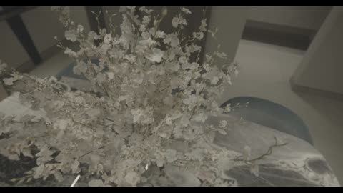 White Flowers on Luxury Marble Table Interior Video