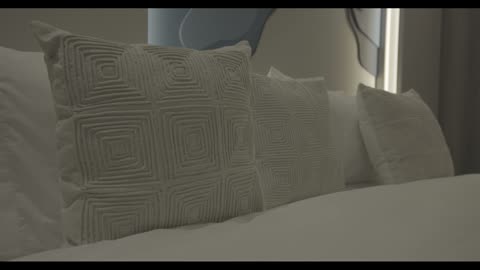 Decorative White Pillows on Hotel Bed Close Up Video