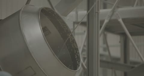 Industrial Rotating Metal Drum Food Factory Footage