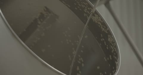 Industrial Seed Coating Drum Rotating Close Up Video