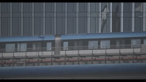 Modern Metro Train Passing Glass Skyscraper Footage
