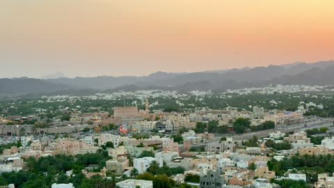 Nizwa City Skyline and Fort Oman Sunset Panning Video