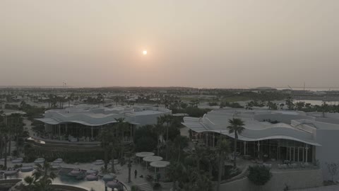 Luxury Seaside Resort Sunset Aerial Drone Footage