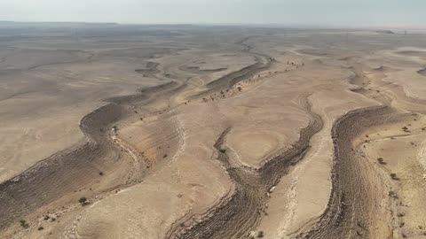 Aerial Drone Flight Over Dry Desert Canyon and Gorge