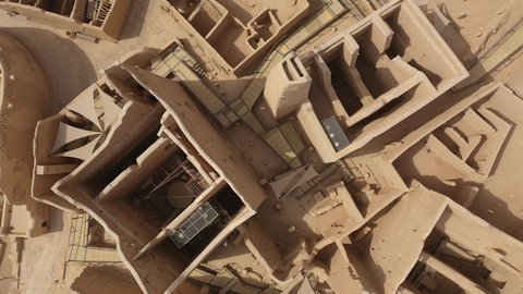 Drone photography of the ancient walls of Diriyah in the city of Riyadh in the Kingdom of Saudi Arabia, the historical Al-Turaif neighborhood, a cultural tourist center, a heritage village, the archaeological buildings in Diriyah, the historical and archa