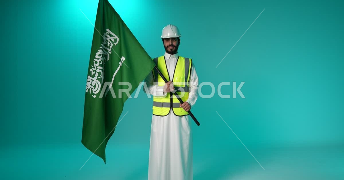 Saudi Arabian Gulf engineer wearing protective jacket and safety helmet